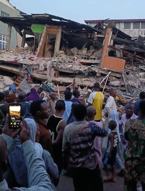 Lagos building collapse rescue workers searching the rubble in Satellite Town
